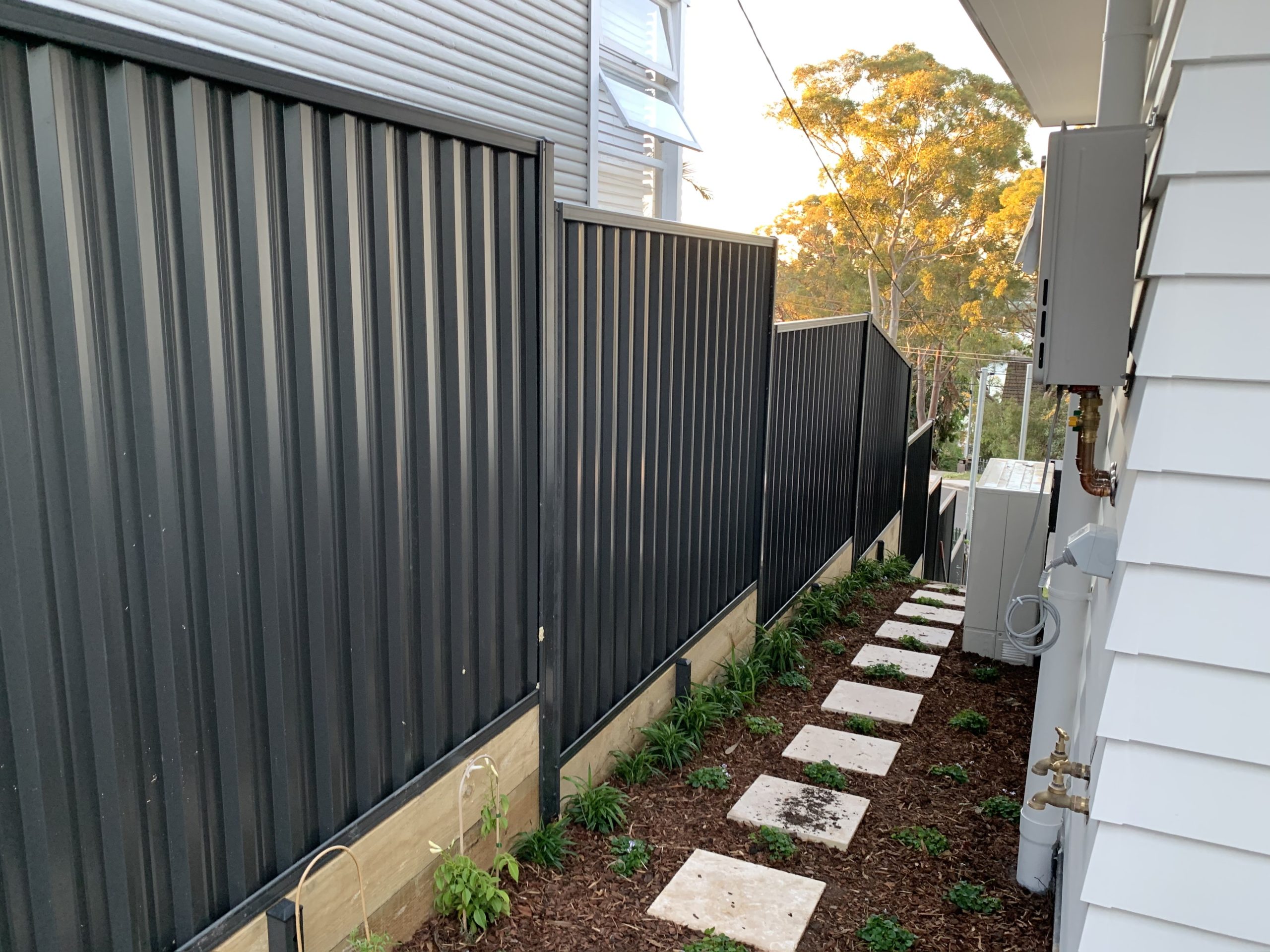 Colorbond Fencing with Treated Pine Sleepers