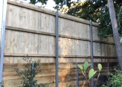 Treated Pine Butted Paling Fence with Treated Pine Sleeper Retaining Wall